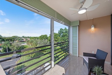 Stunning corner unit condo in the desirable Park Place 55+ on Pembroke Lakes Golf Club in Florida - for sale on GolfHomes.com, golf home, golf lot