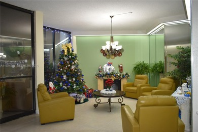 Discover comfort and convenience in this bright 2-bedroom condo on Pembroke Lakes Golf Club in Florida - for sale on GolfHomes.com, golf home, golf lot