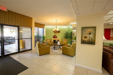 Discover comfort and convenience in this bright 2-bedroom condo on Pembroke Lakes Golf Club in Florida - for sale on GolfHomes.com, golf home, golf lot