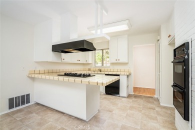 This lovely beach home resides in the center of the Huntington on Meadowlark Golf Club in California - for sale on GolfHomes.com, golf home, golf lot