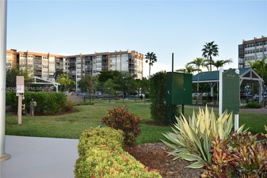 Discover comfort and convenience in this bright 2-bedroom condo on Pembroke Lakes Golf Club in Florida - for sale on GolfHomes.com, golf home, golf lot