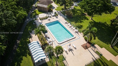 Discover comfort and convenience in this bright 2-bedroom condo on Pembroke Lakes Golf Club in Florida - for sale on GolfHomes.com, golf home, golf lot