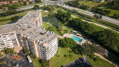 Discover comfort and convenience in this bright 2-bedroom condo on Pembroke Lakes Golf Club in Florida - for sale on GolfHomes.com, golf home, golf lot