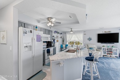 Just what Santa ordered! This fully furnished, 2-bedroom, 2-bath on Brunswick Plantation and Golf Resorts in North Carolina - for sale on GolfHomes.com, golf home, golf lot