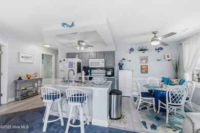 Just what Santa ordered! This fully furnished, 2-bedroom, 2-bath on Brunswick Plantation and Golf Resorts in North Carolina - for sale on GolfHomes.com, golf home, golf lot