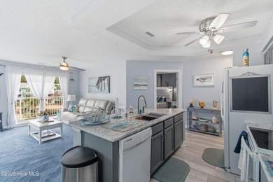 Just what Santa ordered! This fully furnished, 2-bedroom, 2-bath on Brunswick Plantation and Golf Resorts in North Carolina - for sale on GolfHomes.com, golf home, golf lot