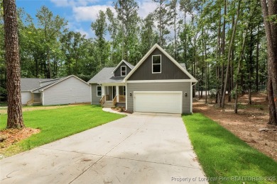 Easy living with this open floor plan, new construction in the on Carolina Trace Country Club in North Carolina - for sale on GolfHomes.com, golf home, golf lot