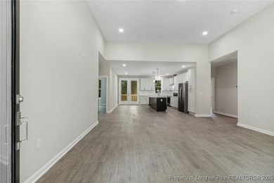 Easy living with this open floor plan, new construction in the on Carolina Trace Country Club in North Carolina - for sale on GolfHomes.com, golf home, golf lot