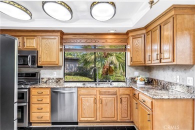 Rarely on the market, this one-of-a-kind single-level home is on Rancho San Joaquin Golf Course in California - for sale on GolfHomes.com, golf home, golf lot