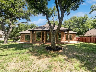 Welcome home to your 3-bedroom 2 bath home with ceramic tile on Pecan Plantation Country Club in Texas - for sale on GolfHomes.com, golf home, golf lot