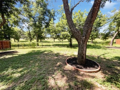 Welcome home to your 3-bedroom 2 bath home with ceramic tile on Pecan Plantation Country Club in Texas - for sale on GolfHomes.com, golf home, golf lot