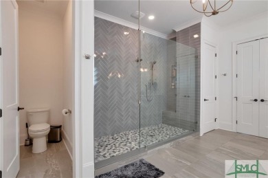 Experience the epitome of luxury living at 908 Indigo Bunting on The Georgia Club in Georgia - for sale on GolfHomes.com, golf home, golf lot