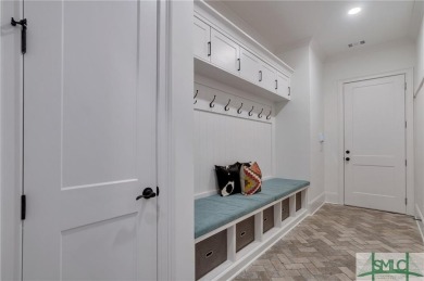 Experience the epitome of luxury living at 908 Indigo Bunting on The Georgia Club in Georgia - for sale on GolfHomes.com, golf home, golf lot