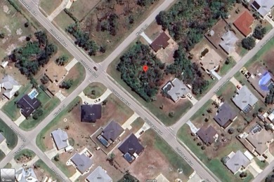 Dreaming of coastal living? This oversized corner lot in on Oyster Creek Golf Club in Florida - for sale on GolfHomes.com, golf home, golf lot