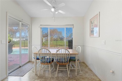 FURNISHED POOL HOME W/CANAL VIEW IN ROTONDA WEST - This move-in on Pinemoor West Golf Club in Florida - for sale on GolfHomes.com, golf home, golf lot