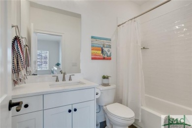 Experience the epitome of luxury living at 908 Indigo Bunting on The Georgia Club in Georgia - for sale on GolfHomes.com, golf home, golf lot