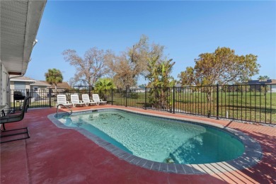 FURNISHED POOL HOME W/CANAL VIEW IN ROTONDA WEST - This move-in on Pinemoor West Golf Club in Florida - for sale on GolfHomes.com, golf home, golf lot
