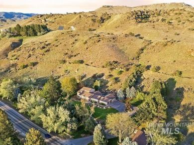 An extraordinary estate set on vast  sprawling acreage just on Warm Springs Golf Club in Idaho - for sale on GolfHomes.com, golf home, golf lot