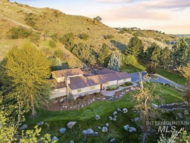An extraordinary estate set on vast  sprawling acreage just on Warm Springs Golf Club in Idaho - for sale on GolfHomes.com, golf home, golf lot