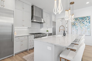 Located in Regatta Bay's newest community, Tradewinds, this on Regatta Bay Golf and Country Club in Florida - for sale on GolfHomes.com, golf home, golf lot