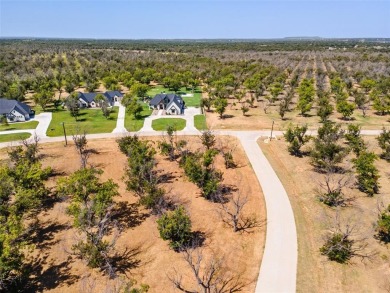 Fantastic opportunity to own a premier 1.2 acre corner lot in on Pecan Plantation Country Club in Texas - for sale on GolfHomes.com, golf home, golf lot