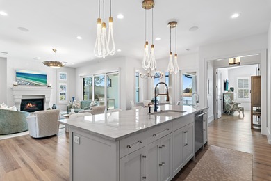 Located in Regatta Bay's newest community, Tradewinds, this on Regatta Bay Golf and Country Club in Florida - for sale on GolfHomes.com, golf home, golf lot