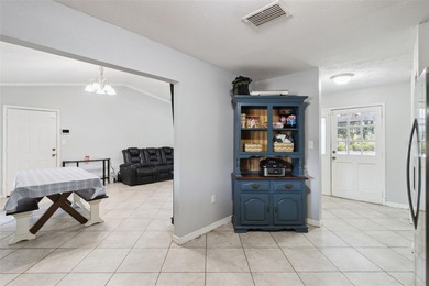 Beautiful 3-bedroom, 2-bath Corner Lot home with tile roof on Indian Lake Estates Golf and Country Club in Florida - for sale on GolfHomes.com, golf home, golf lot