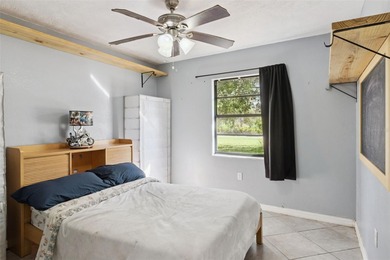 Beautiful 3-bedroom, 2-bath Corner Lot home with tile roof on Indian Lake Estates Golf and Country Club in Florida - for sale on GolfHomes.com, golf home, golf lot