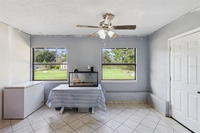 Beautiful 3-bedroom, 2-bath Corner Lot home with tile roof on Indian Lake Estates Golf and Country Club in Florida - for sale on GolfHomes.com, golf home, golf lot