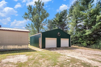 Welcome to 13660 18 Mile Rd., Gowen - a peaceful country retreat on The Links of Bowen Lake in Michigan - for sale on GolfHomes.com, golf home, golf lot