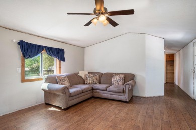 Welcome to 13660 18 Mile Rd., Gowen - a peaceful country retreat on The Links of Bowen Lake in Michigan - for sale on GolfHomes.com, golf home, golf lot