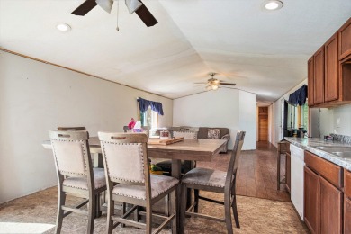 Welcome to 13660 18 Mile Rd., Gowen - a peaceful country retreat on The Links of Bowen Lake in Michigan - for sale on GolfHomes.com, golf home, golf lot