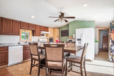 Welcome to 13660 18 Mile Rd., Gowen - a peaceful country retreat on The Links of Bowen Lake in Michigan - for sale on GolfHomes.com, golf home, golf lot