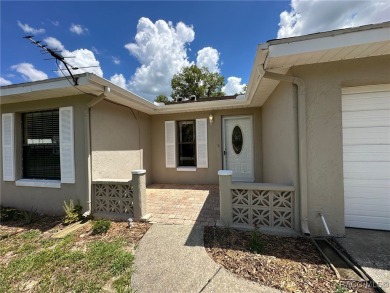 Discover this affordable Citrus Springs home, ideally located on Citrus Springs Country Club in Florida - for sale on GolfHomes.com, golf home, golf lot