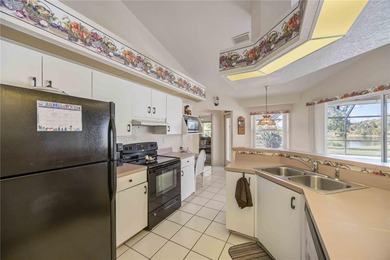 Turnkey furnished home with an INCREDIBLE, ONE-OF-A-KIND, 180 on Pinemoor West Golf Club in Florida - for sale on GolfHomes.com, golf home, golf lot