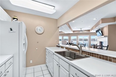 Not 1 but 2 BOAT SLIPS INCLUDED. Top-floor, end-unit lakefront on Seasons Ridge At Four Seasons in Missouri - for sale on GolfHomes.com, golf home, golf lot