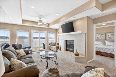 Not 1 but 2 BOAT SLIPS INCLUDED. Top-floor, end-unit lakefront on Seasons Ridge At Four Seasons in Missouri - for sale on GolfHomes.com, golf home, golf lot