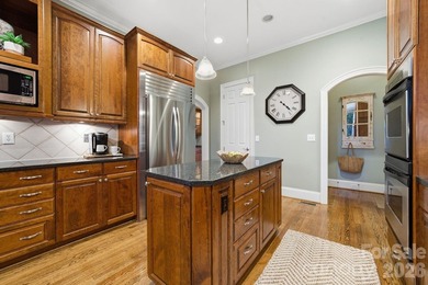 Set on a private golf course lot overlooking the 6th hole, this on Trump National Golf Club Charlotte in North Carolina - for sale on GolfHomes.com, golf home, golf lot