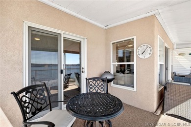 Not 1 but 2 BOAT SLIPS INCLUDED. Top-floor, end-unit lakefront on Seasons Ridge At Four Seasons in Missouri - for sale on GolfHomes.com, golf home, golf lot