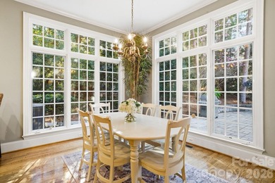 Set on a private golf course lot overlooking the 6th hole, this on Trump National Golf Club Charlotte in North Carolina - for sale on GolfHomes.com, golf home, golf lot