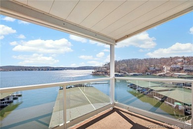 Not 1 but 2 BOAT SLIPS INCLUDED. Top-floor, end-unit lakefront on Seasons Ridge At Four Seasons in Missouri - for sale on GolfHomes.com, golf home, golf lot