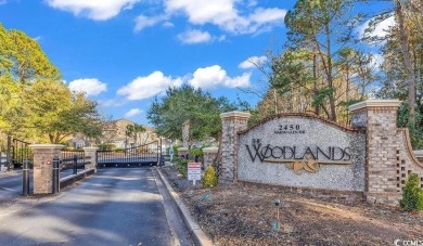 #321 The Woodlands is a gorgeous 3-bedroom, 3 full-bath on Barefoot Resort and Golf Club  in South Carolina - for sale on GolfHomes.com, golf home, golf lot