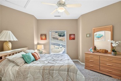 Not 1 but 2 BOAT SLIPS INCLUDED. Top-floor, end-unit lakefront on Seasons Ridge At Four Seasons in Missouri - for sale on GolfHomes.com, golf home, golf lot