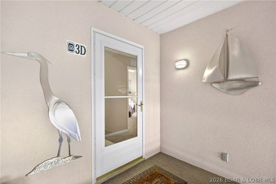 Not 1 but 2 BOAT SLIPS INCLUDED. Top-floor, end-unit lakefront on Seasons Ridge At Four Seasons in Missouri - for sale on GolfHomes.com, golf home, golf lot