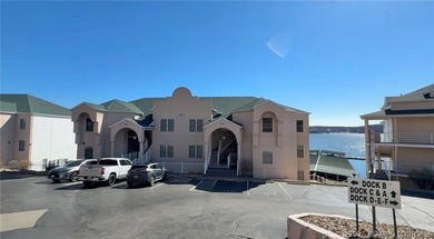 Not 1 but 2 BOAT SLIPS INCLUDED. Top-floor, end-unit lakefront on Seasons Ridge At Four Seasons in Missouri - for sale on GolfHomes.com, golf home, golf lot