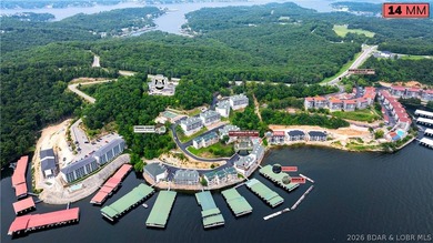 Not 1 but 2 BOAT SLIPS INCLUDED. Top-floor, end-unit lakefront on Seasons Ridge At Four Seasons in Missouri - for sale on GolfHomes.com, golf home, golf lot