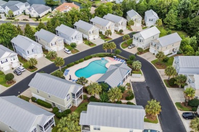 Coastal Elegance Just Minutes from the Sand - Raised Beach Home on Surf Golf and Beach Club in South Carolina - for sale on GolfHomes.com, golf home, golf lot