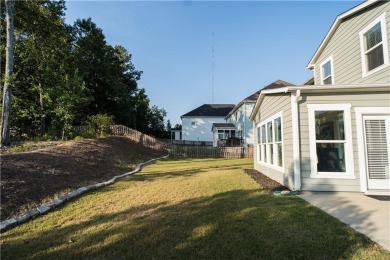 This stunning, *practically new*, and move-in ready home, sits on Reunion Golf Club in Georgia - for sale on GolfHomes.com, golf home, golf lot