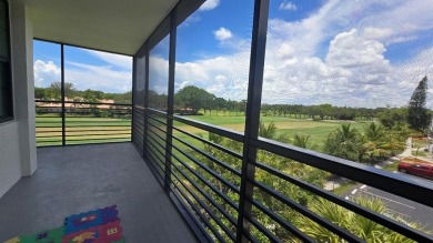 Welcome to this gut-renovated 2-bedroom, 2-bathroom penthouse on The Club at Emerald Hills in Florida - for sale on GolfHomes.com, golf home, golf lot