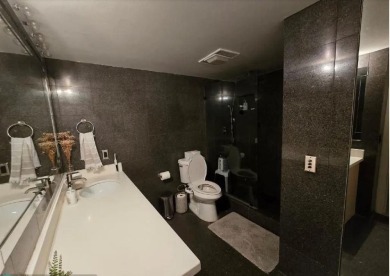 Welcome to this gut-renovated 2-bedroom, 2-bathroom penthouse on The Club at Emerald Hills in Florida - for sale on GolfHomes.com, golf home, golf lot
